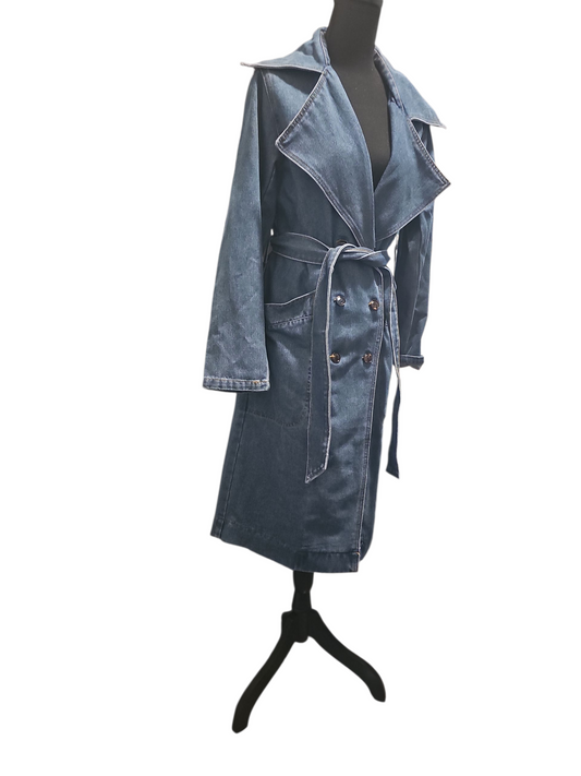 Denim trench coat on a mannequin against a white background